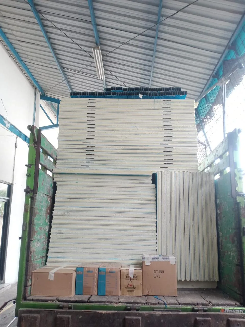 Frozen stock stacked on racks inside a cold storage room